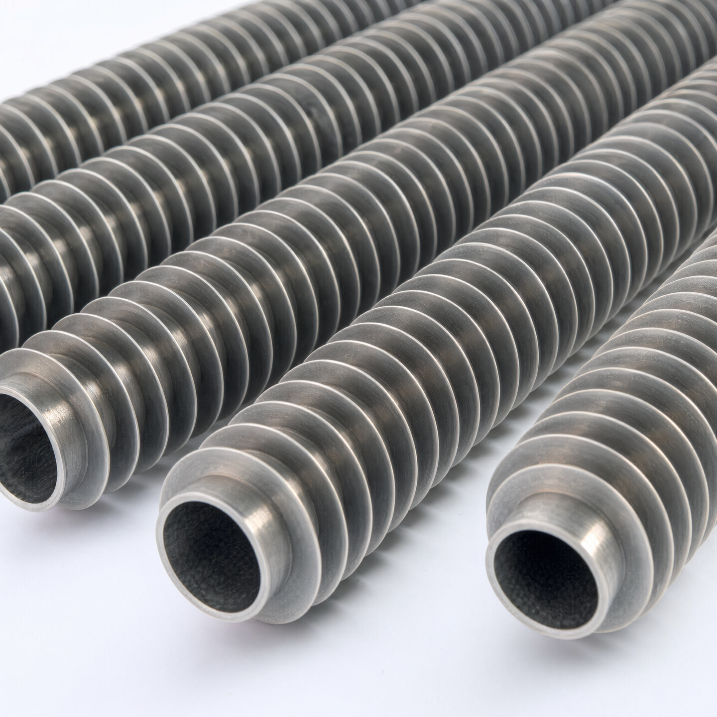 Macro view of continuous fins on parallel heat exchanger tubes